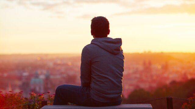 man watching the sunrise