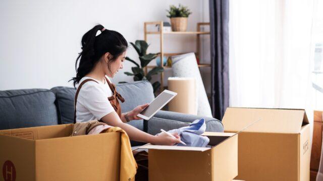 young woman moving into her first home