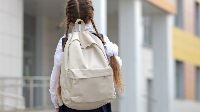 young girl going to school